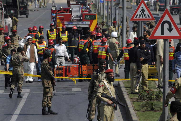 Image: Soldiers cordon off a street near the site of a suicide bomb attack in Lahore