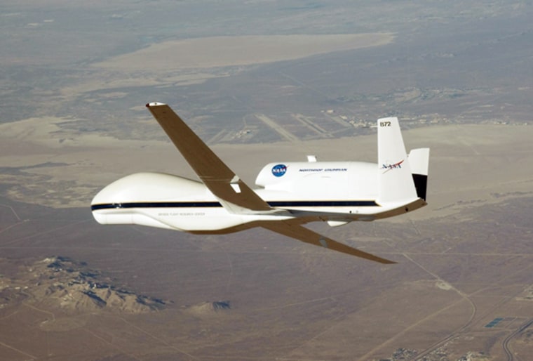 NASA's Global Hawk banks for landing over Rogers Dry Lake in California at the end of a test flight on Oct. 23, 2009. Its first official flight is scheduled for mid-April.