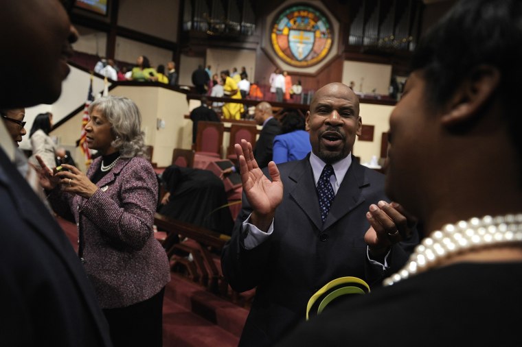 Image: The Brownings greet worshippers after a Sunday morning service at Ebenezer AME Church in Fort Washington, Maryland