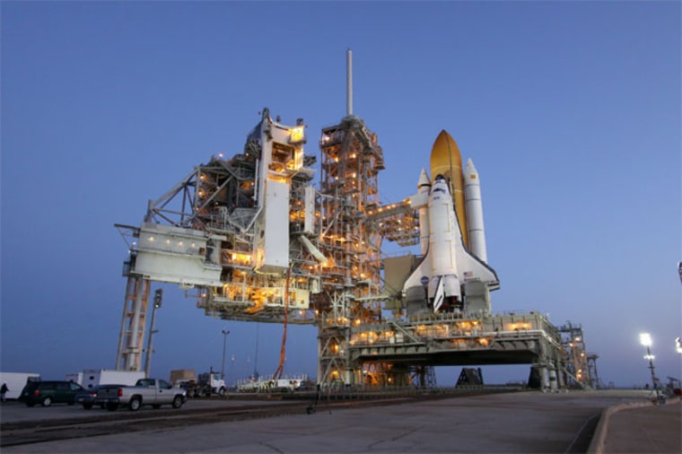 The space shuttle Discovery stands ready at Launch Pad 39A at Kennedy Space Center in preparation for its planned April 5, 2010 launch. 