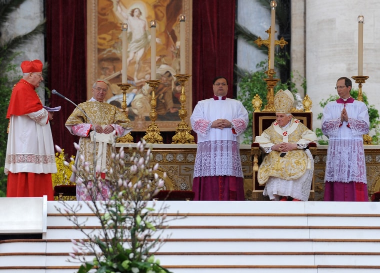Image: Pope Benedict XVI (R seat ) listens to the speech of Cardinal Angelo Sodano