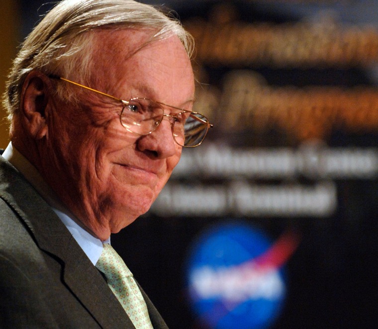 Apollo 11 commander Neil Armstrong, shown here receiving the space agency's Ambassador of Exploration Award in 2006, says that dropping the Constellation program to develop new Ares launch vehicles is