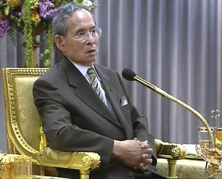 Image: Thailand's King Bhumibol Adulyadej speaks during a swearing-in ceremony for new judges in Bangkok