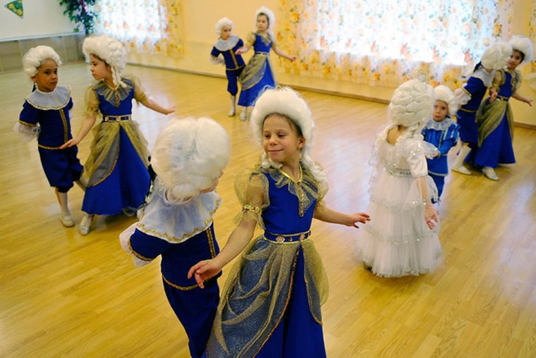 Children dance in 18th-century costumes at Russia’s Orphanage No. 11. 