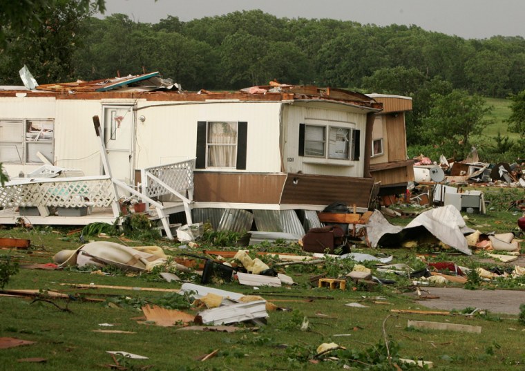 Image: Homes lie in shambles in the mobile home community of Prairie Creek Village in Slaughterville, Okla