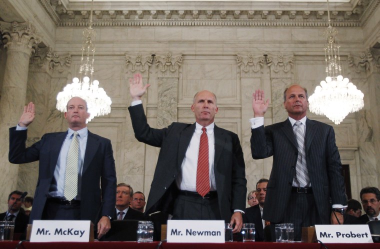 Image: McKay, Chairman and President of BP America, Newman, CEO of Transocean Ltd. and Probert, President of Global Business Lines of Halliburton testify before a Senate hearing in Washington