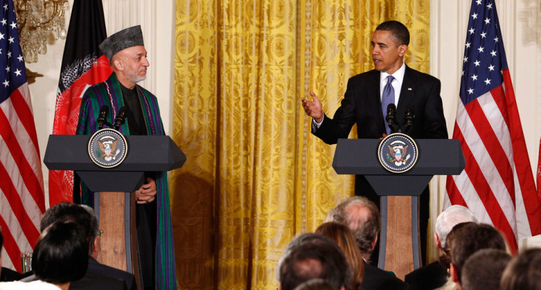 Image: U.S. President Obama and Afghan President Karzai make statements during a joint news conference in the East Room at the White House in Washington
