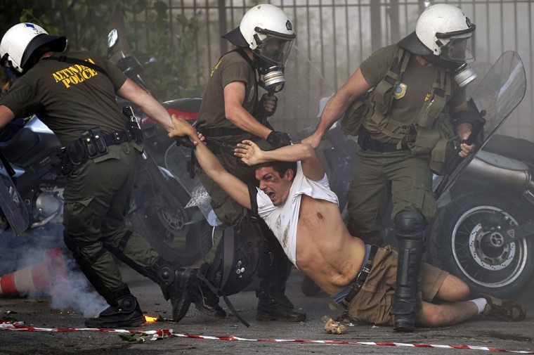 Image: Police drag a protestor during a pro-Palestine demonstration