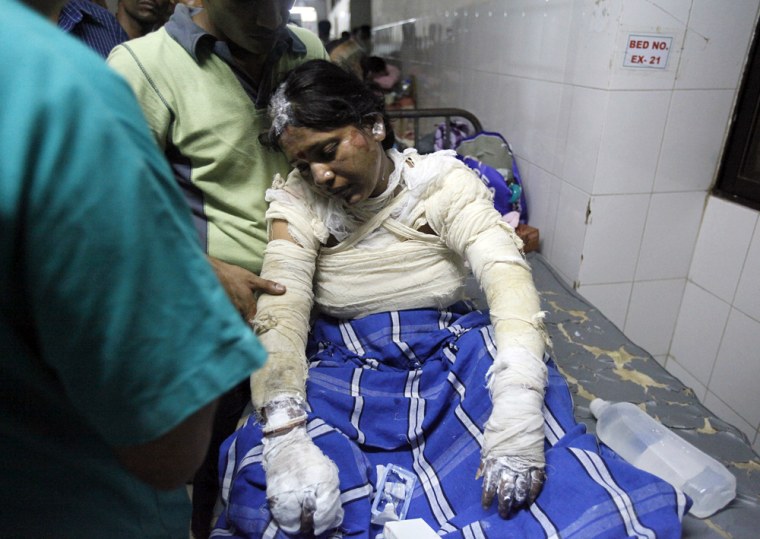 Image: One of the survivors of a fire that sparked in Old Dhaka