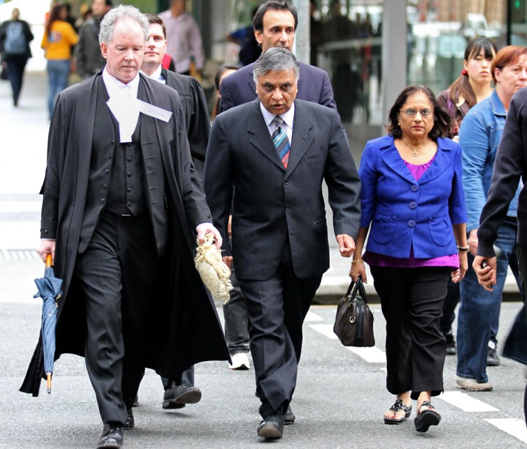 Image: Dr. Jayant Patel, center, arrives at the Supreme Court in Brisbane, Australia