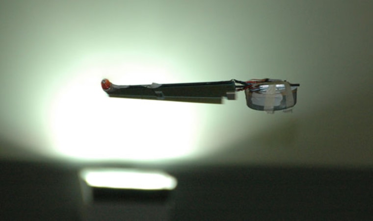 A prototype of the Samurai, a remote-controlled, battery-powered Nano Aerial Vehicle with two flapping wings that weighs about as much as two nickels and is just slightly longer than three inches. 