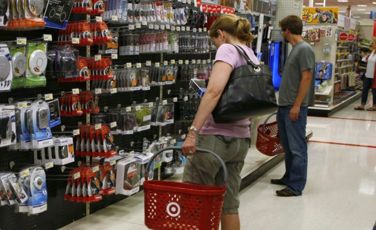 Image: Shoppers browse in a store in Virginia