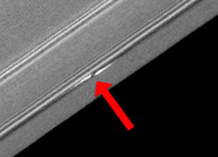 A close-up shot of one of the propeller-shaped structures in the rings of Saturday. The image, released July 8, 2010, was obtained by NASA's Cassini spacecraft of the unlit side of Saturn's rings. 