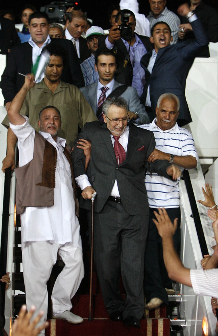 Image: Libyans greeting freed Lockerbie bomber Abdelbaset Ali Mohmet al-Megrahi