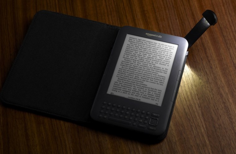 Image: Third-gen Kindle in lighted leather book cover