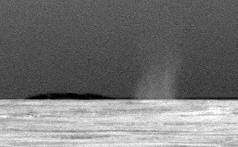 This photo taken July 15, 2010 shows the first dust devil observed by NASA's Mars Exploration Rover Opportunity in the rover's six-and-a-half years on Mars. Credit: NASA/JPL-Caltech/Cornell University/Texas A&M