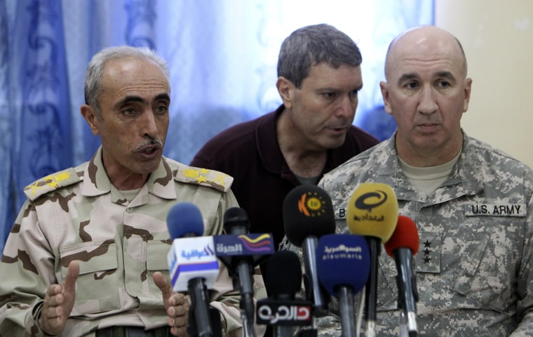 Image: Iraq's Army Chief Zebari and U.S. Lieutenant General Barbero hold a news conference at an Iraqi military base in Kirkuk