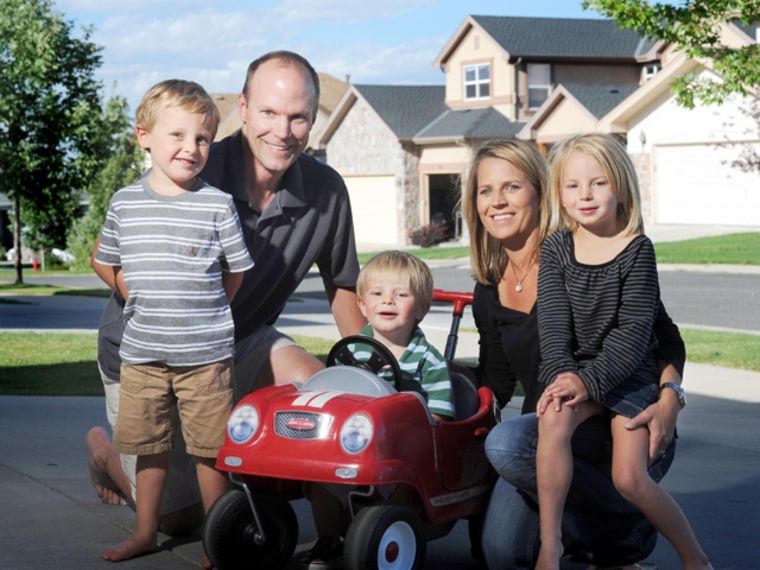 PIC FROM CATERS NEWS - The parents of a toddler whose heart stopped for nearly an HOUR after he was submerged in freezing cold water have hailed his survival as a miracle. Little Gore Otteson (pictured, middle, with mum Amy, dad Dave, brother Kirk, left, and sister Ryan, right) was without a heartbeat for between 50 to 55 minutes after he wandered away from the family holiday cabin and ended up face down in an irrigation ditch. It is thought he had been under the ice-cold water for about 25 minutes before he was found and his rescuers began CPR immediately. But his heart did not start for nearly half an hour after he was found and doctors told his grief-stricken parents there was less than a one per cent chance he would have any brain function. SEE CATERS COPY.