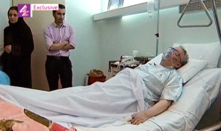 Image: Abdelbaset Ali Mohmet al-Megrahi surrounded by family members in his hospital bed