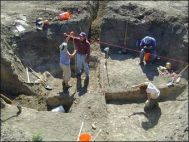 Experts excavate an early Pueblo pit house as part of the Animas-La Plata archaeological project. Scientists have learned more about the catastrophic end of a community at the Sacred Ridge Site, the largest and most complex Pueblo site in the the Animas-La Plata project area.