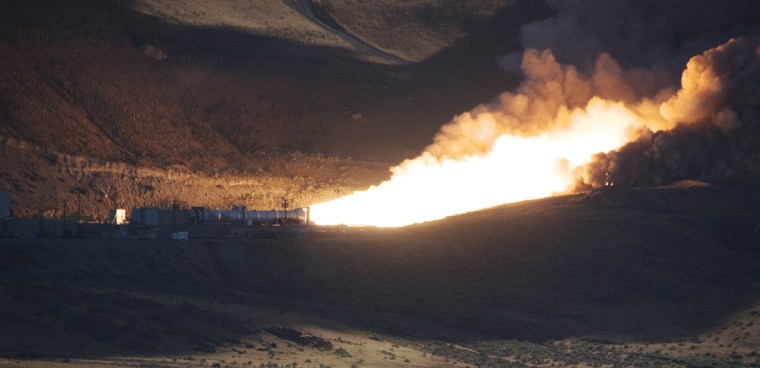 NASA and Alliant Techsystems successfully fire a first-stage rocket motor in the Utah desert on Tuesday.