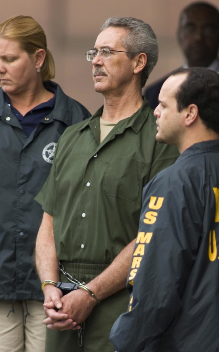 Image: File photo of Allen Stanford leaveing federal court in Houston