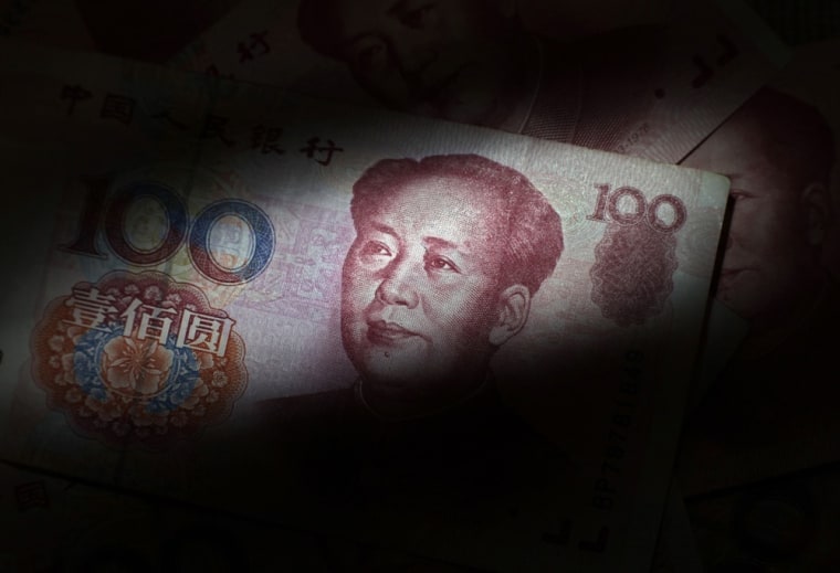 Image: Yuan banknotes are seen in this illustrative photograph taken in Beijing