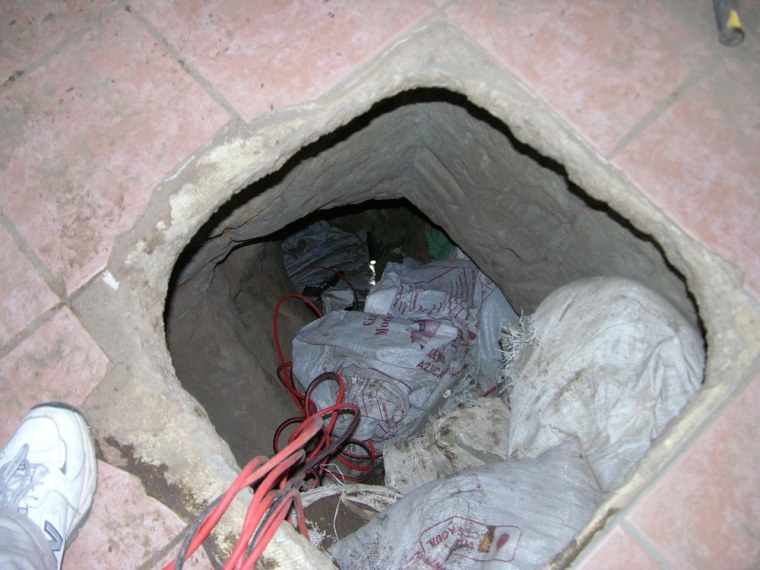 Image: A view of the entrance to a recently constructed tunnel at a home in Nogales, Arizona