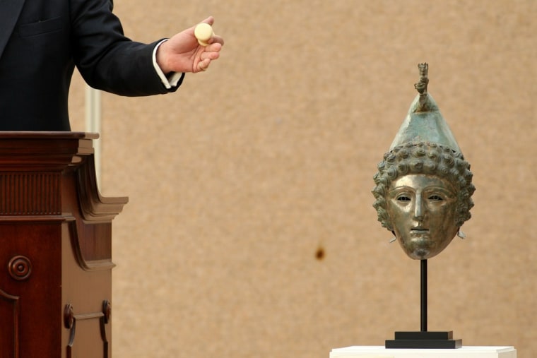 Image: Roman Bronze helmet sold at auction
