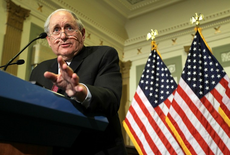 Image: U.S. Senate Armed Services Committee Chairman Sen. Carl Levin briefs on the investigation into private security contractors in Afghanistan.