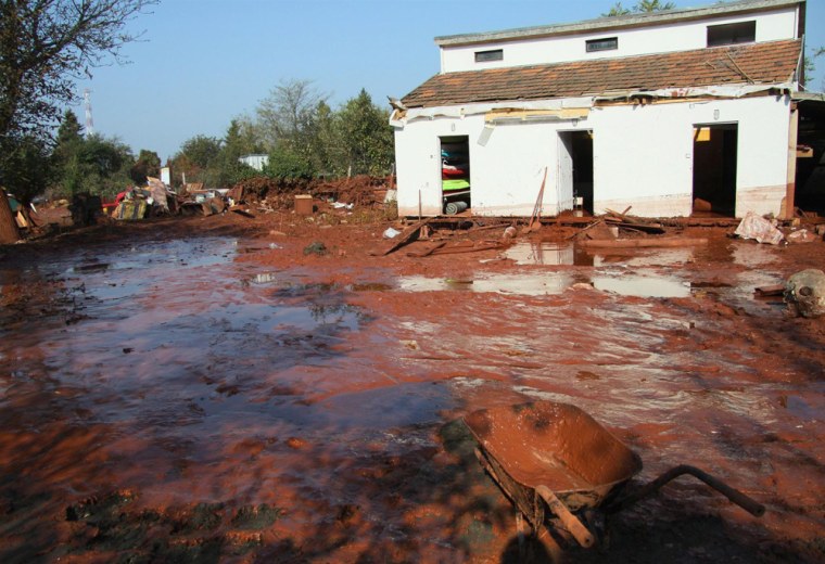 Image: Homes and gardens in Devecser, Hungary on Oct. 14, following the toxic sludge flood which reached 2 meters in some locations.