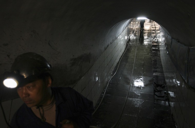 Image: A rescuer is seen in a tunnel of the Pingyu No.4 Coal mine in Yuzhou