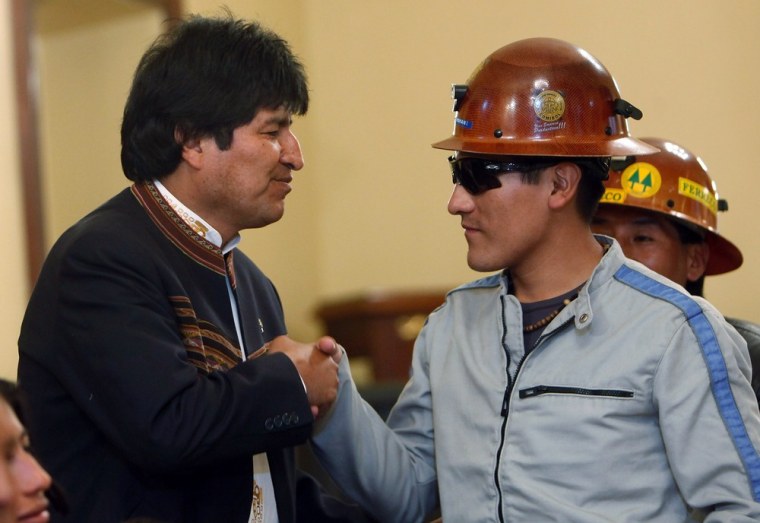 Image: Bolivia President Evo Morales and miner Carlos Mamani