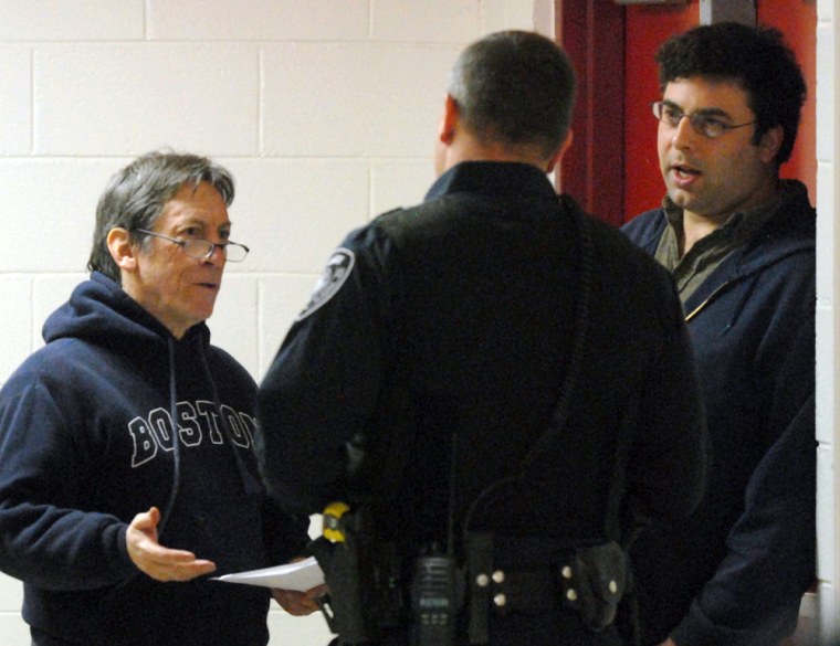 Image: Attorney John McKay, second from left, and Alaska Dispatch founder and editor Tony Hopfinger, right, talk to Anchorage Police after Hopfinger was detained