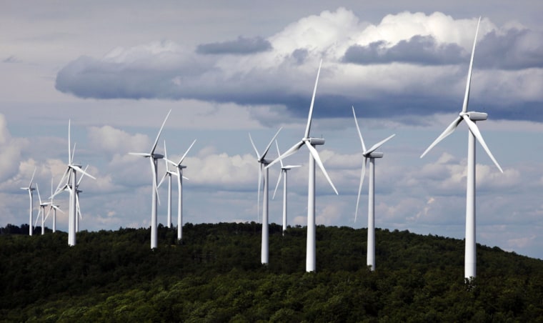 Image:  Windmills turn as they catch the wind on Stetson Mountain in Range 8, Township 3, Maine.