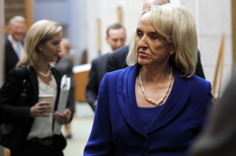 Image: Arizona Governor Jan Brewer enters a news conference at U.S. Ninth Circuit Court of Appeals in San Francisco