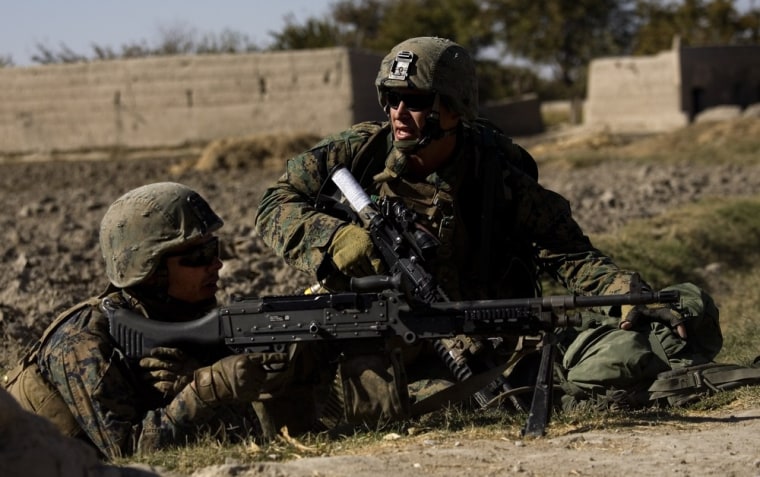 Image: Marines return fire in Sangin, Afghanistan