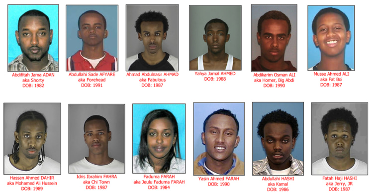 Image: 12 of the 29 people that have been indicted and taken into custody in a sex trafficking ring in which Somali gangs in Minneapolis and St. Paul