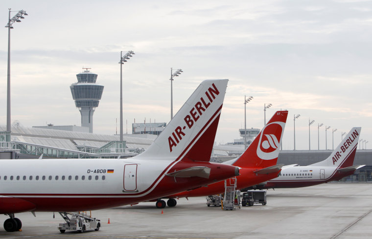 Image: German airlines Air Berlin aircrafts stand at Munich's airport apron
