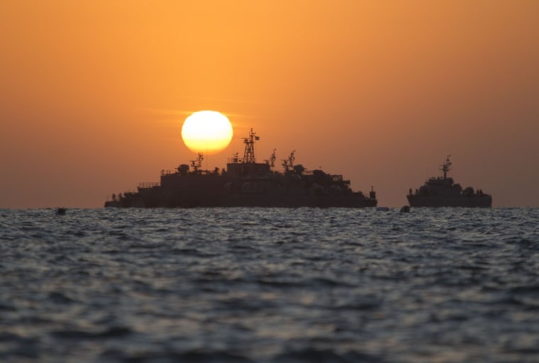 Image: South Korean ships stage off of the coast of South Korea's Yeonpyeong Island