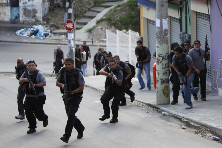 Image: Police officers in Rio de Janeiro slum