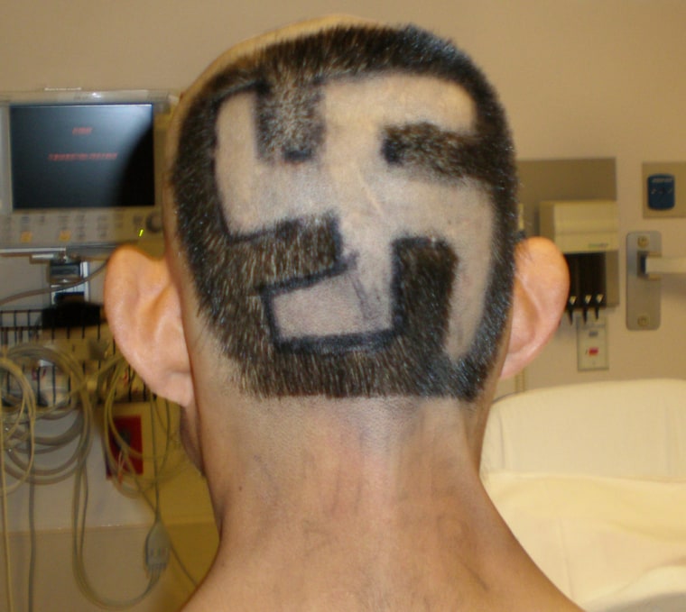 Image: Man with swastika shaved in his head