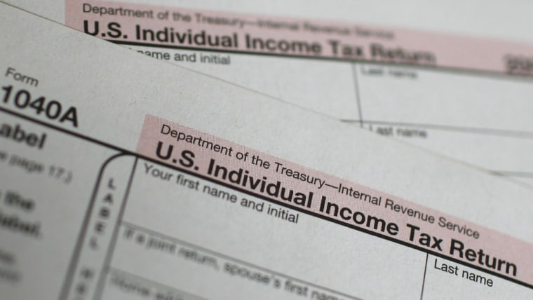 Image: U.S. 1040A Individual Income Tax form is seen at a U.S. Post office in New York