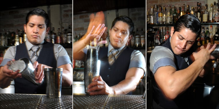Marcos Tello, a bartender at Varnish in Los Angeles, demonstrates the physically demanding style of mixing cocktails requiring the use of large ice cubes and shakers.