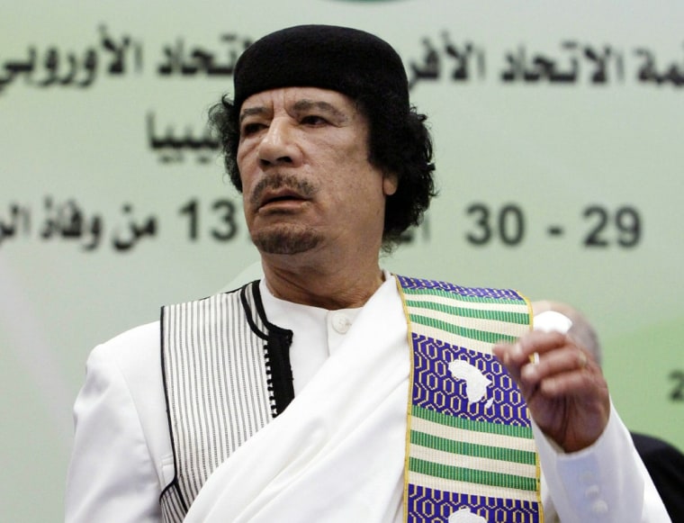 Image: Libyan leader Moamer Kadhafi attends the