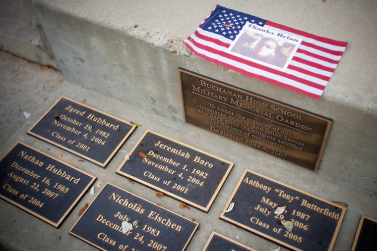 Image: The plaques placed in memory of former students killed in the wars in Afghanistan and Iraq as seen in the memorial garden of Buchanan High School in Clovis, Calif.