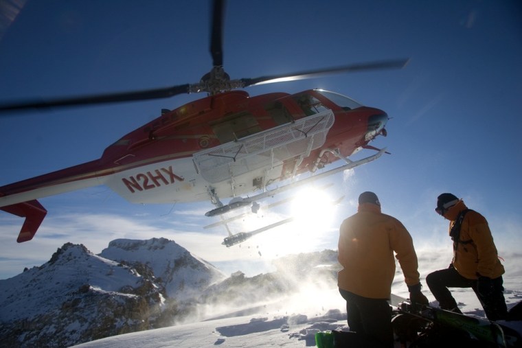 Image: Helicopter and skiers
