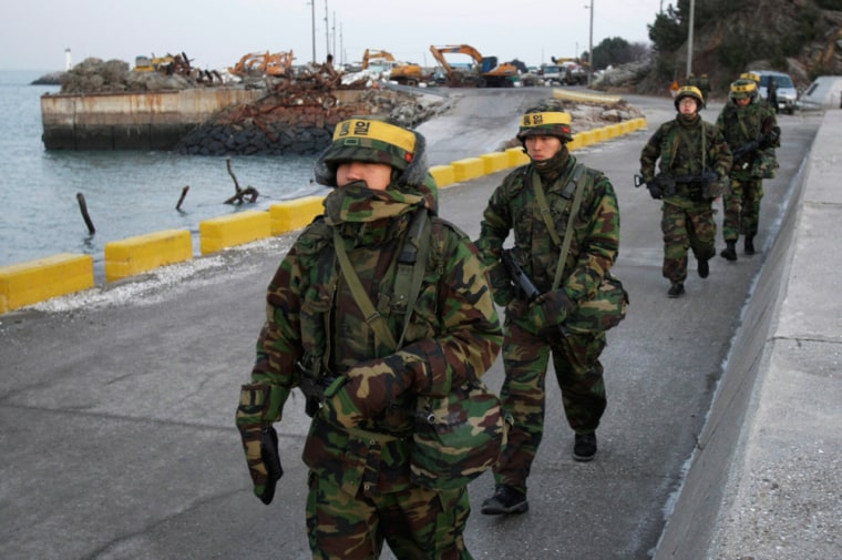 Image: South Korean marines patrol on Yeonpyeong Island