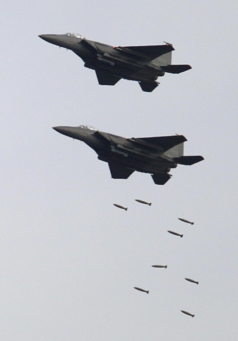 Image: F-15K fighter jets drop bombs during military exercises