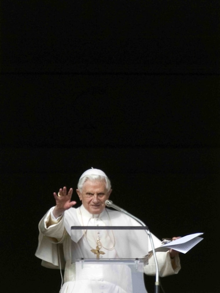 Image: Pope Benedict XVI delivers his blessing during the Angelus noon prayer